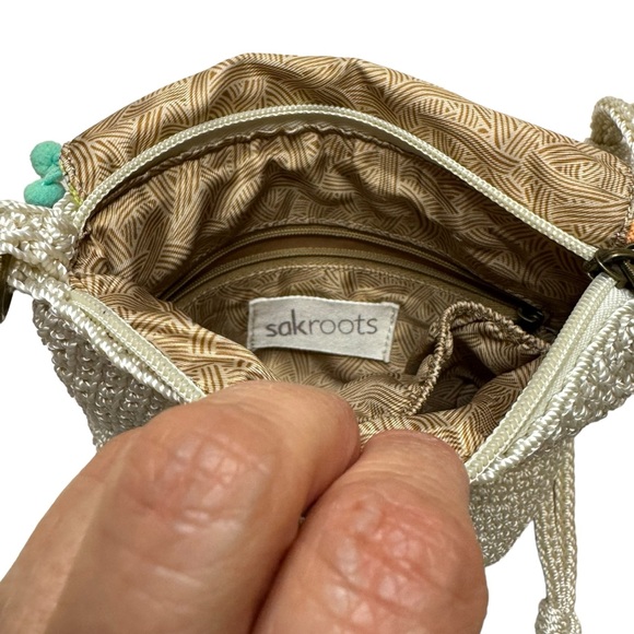 Sakroots Beige Women's Crochet Peace Crossbody Purse Bag Pom Pom Flap - Picture 7 of 8